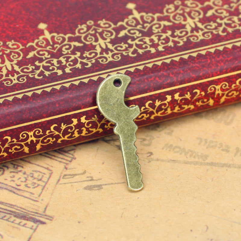 Small Skull Key Alloy Charm Pendant, Single-Sided, 25x9mm