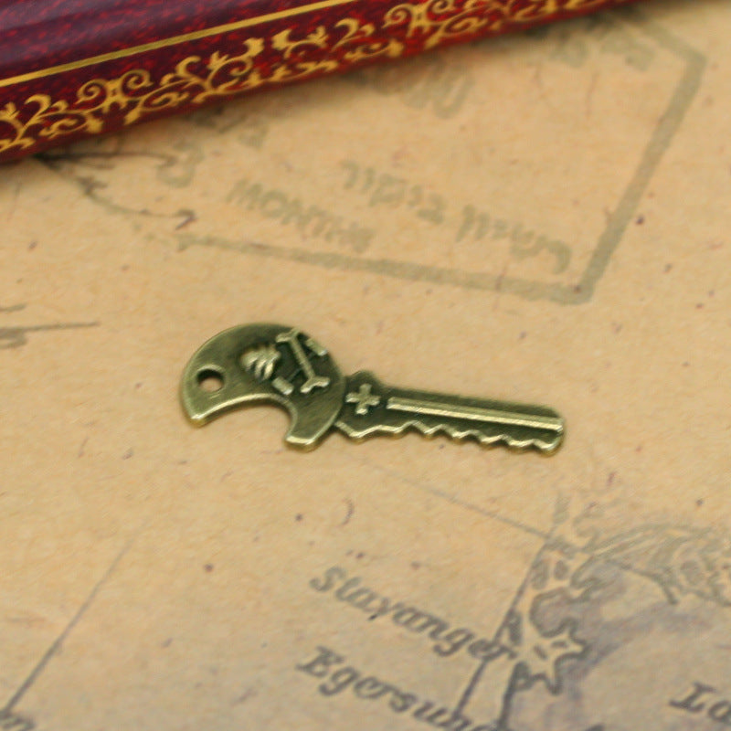 Small Skull Key Alloy Charm Pendant, Single-Sided, 25x9mm