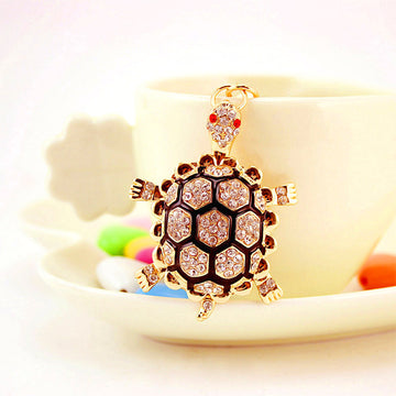 Gold-Tone Turtle Keychain With Clear Stones And Black Shell