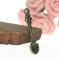 Long Shell Spoon Charm with Floral Handle in Three Finishes view 3