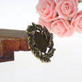 Leaf Wreath Oval Cabochon Settings in Three Finishes view 4
