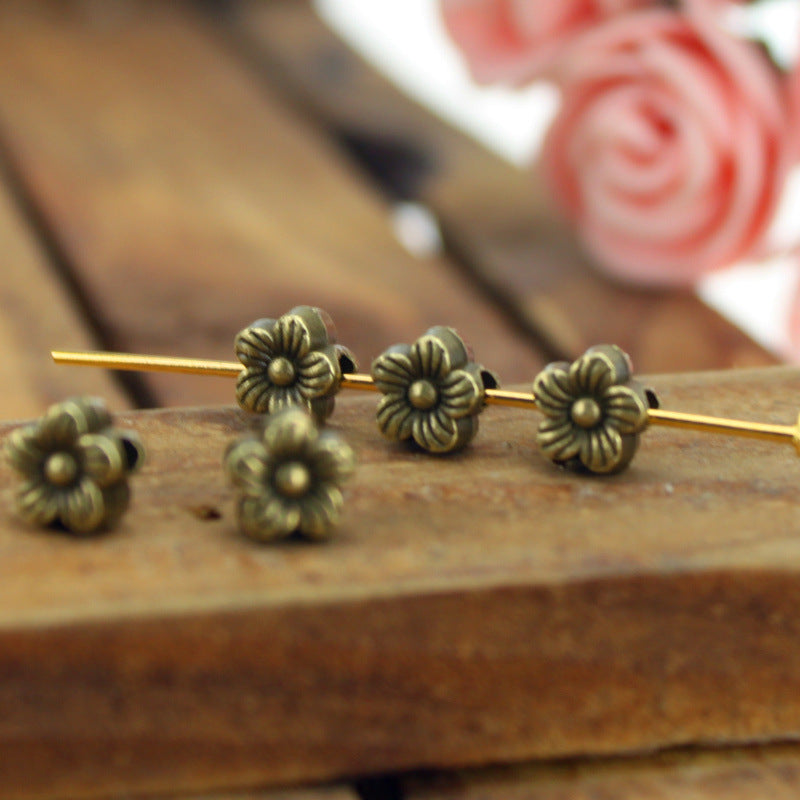 6mm Vintage Plum Blossom Spacer Beads