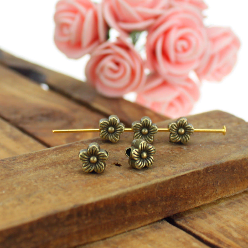 6mm Vintage Plum Blossom Spacer Beads