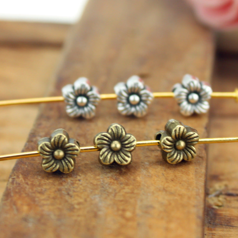 6mm Vintage Plum Blossom Spacer Beads