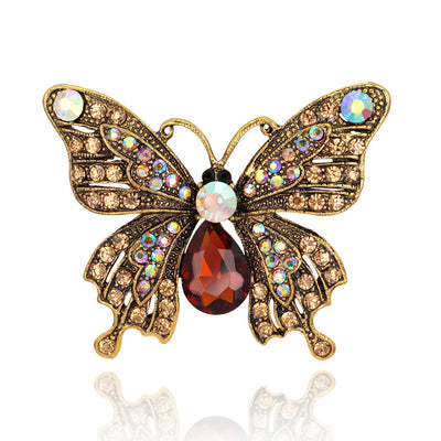 Front product view of the butterfly brooch pin in gold and red