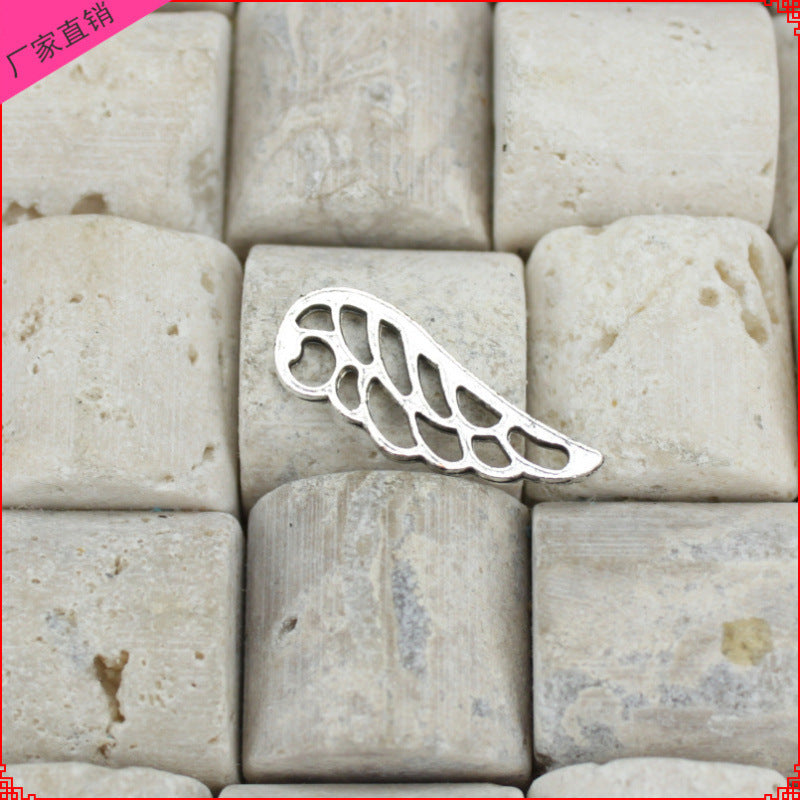 Hollow Wing Alloy Charm Pendant 24x9mm