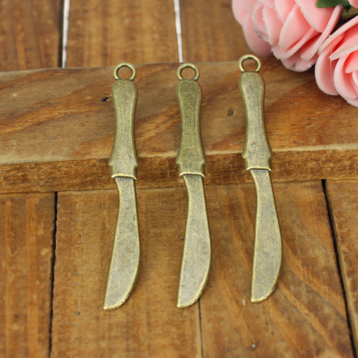 Vintage Alloy Flying Knife Charm Pendant 53x6mm