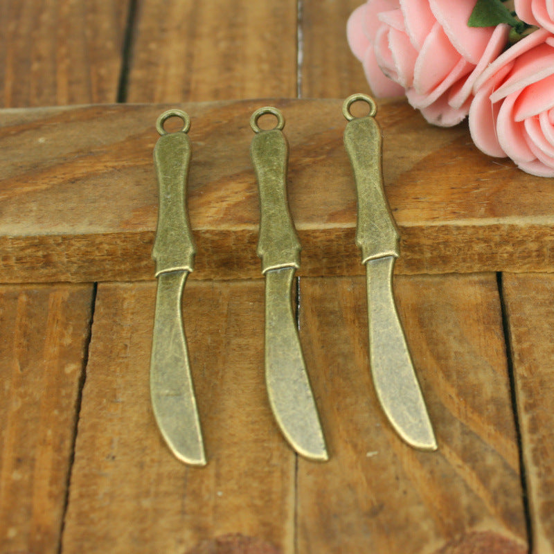 Vintage Alloy Flying Knife Charm Pendant 53x6mm