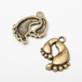 Pair of Tiny Footprint Metal Charms in Three Finishes view 6