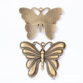 Antique Metal Layered Butterfly Charm Pendant With Textured Detail, 2 Finishes view 5