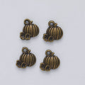 Ribbed Pumpkin and Vine Charm in Three Metallic Finishes view 6