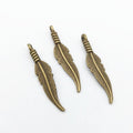 Slender Feather Metal Charms in Six Antique Finishes view 7