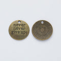 Never Give Up Round Message Charm in Four Metal Finishes view 6
