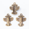 Small Airplane Charms in Two Antique Metal Finishes view 6