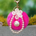 Faux Fur Pom Pom Keychain Collection With Pearl and Floral Charms view 3