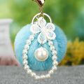 Faux Fur Pom Pom Keychain Collection With Pearl and Floral Charms view 4