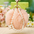 Pearl Loop Plush Pom Pom Keychain with White Clover Charm view 2