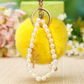 Pearl Loop Plush Pom Pom Keychain with White Clover Charm view 3