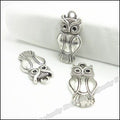 Long Owl Pendant with Recessed Wing Panels in Four Finishes view 3