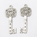 Floral Bow Skeleton Key Charm in Multiple Metal Finishes for Jewelry Making view 3