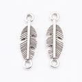 Double Loop Feather Connector Charm in Three Metal Finishes view 3