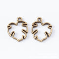 Open Monstera Leaf Metal Bezel Charm in Two Antique Finishes view 3