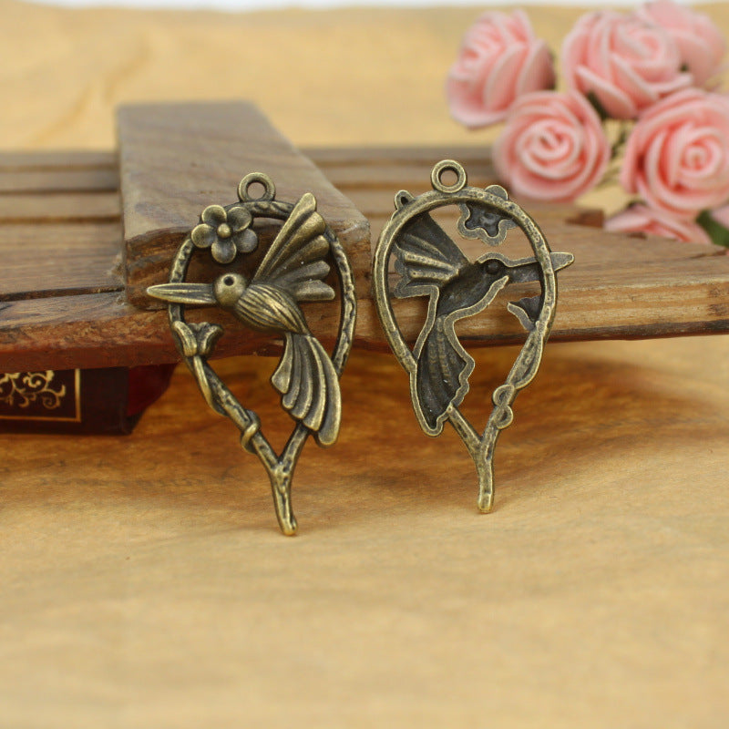 Vintage Alloy Magpie Bird and Vine Charm Pendant 42x24mm