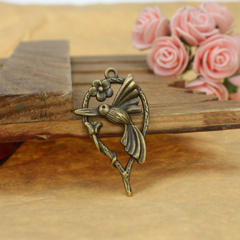 Vintage Alloy Magpie Bird and Vine Charm Pendant 42x24mm