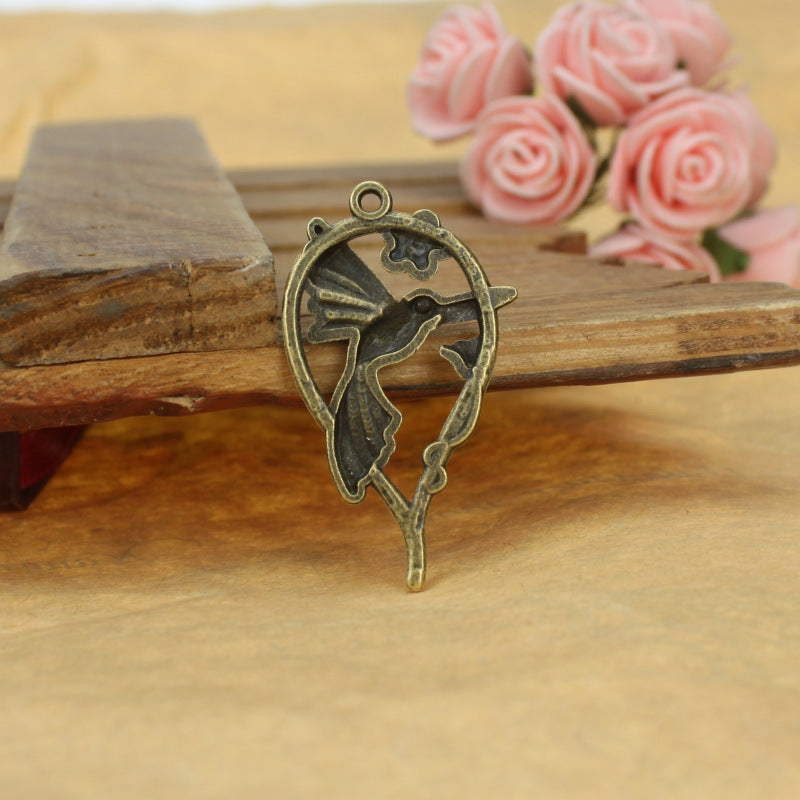 Vintage Alloy Magpie Bird and Vine Charm Pendant 42x24mm