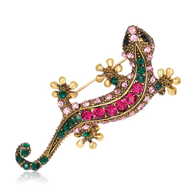 Front product view of the gecko brooch pin in gold and red