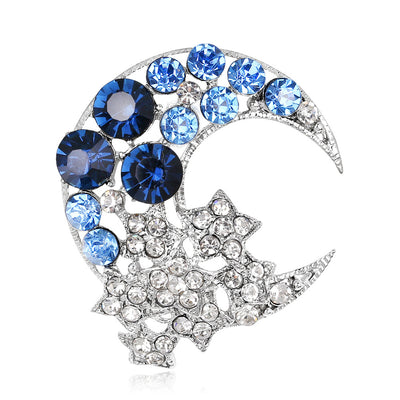 Front product view of the moon brooch pin in silver and blue