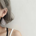 White Pink and Light Blue Feather Wing Chain Earrings view 4