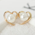 White Pearl Look Heart Outline Gold Tone Stud Earrings view 2
