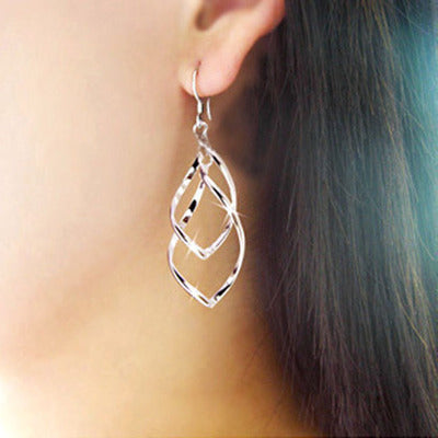 Primary supplied view of twisted ribbon open-drop earrings