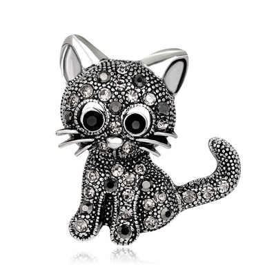 Front product view of the cat brooch pin in silver and black