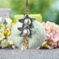Twin Flower Plush Pom Pom Keychain with Pearl and Leaf Drops view 3