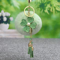 Four-Leaf Clover Tassel Plush Pom Pom Keychain in Pale Lavender view 4