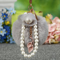 Flower Pearl Loop Plush Pom Pom Keychain in Pale Pink view 2