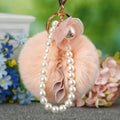 Flower Pearl Loop Plush Pom Pom Keychain in Pale Pink view 3
