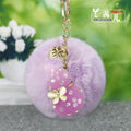 Butterfly Gourd Plush Pom Pom Keychain in Pale Lavender view 1