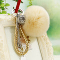 Palace Bell Faux Fur Pom Pom Keychains in Forty Pictured Options view 9