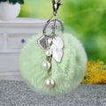 Mixed Faux Fur Pom Pom Keychains With Floral and Metal Charms view 2