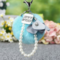 Faux Fur Pom Pom Keychains With Floral, Leaf and Letter Charms view 3