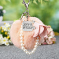 Faux Fur Pom Pom Keychains With Floral, Leaf and Letter Charms view 6