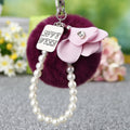 Faux Fur Pom Pom Keychains With Floral, Leaf and Letter Charms view 4