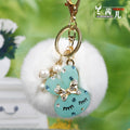 Sleepy Rabbit Faux Fur Pom Pom Keychains in Twenty Pictured Options view 6