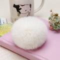 Sleepy Rabbit Faux Fur Pom Pom Keychains in Twenty Pictured Options view 12