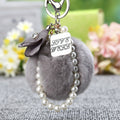 Faux Fur Pom Pom Keychains With Floral, Leaf and Letter Charms view 1
