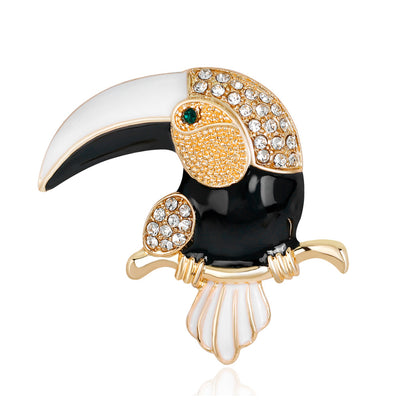 Front product view of the parrot brooch pin in gold and black