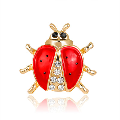 Front product view of the ladybug brooch pin in red and gold